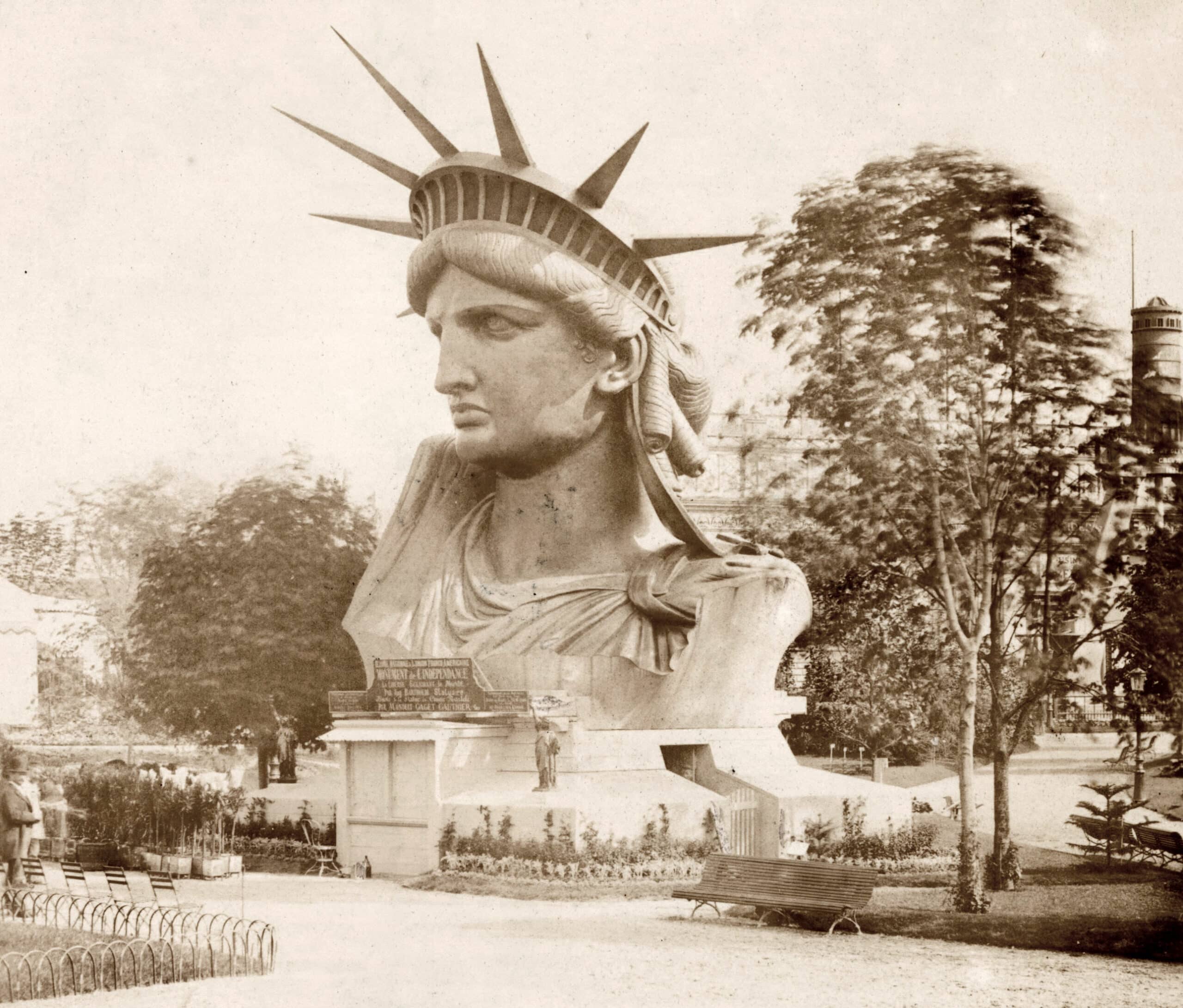 Head of the Statue of Liberty on display in a park in Paris