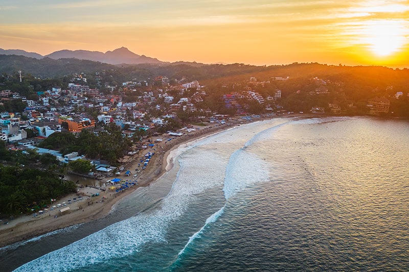 Aerial of riviera Nayarit in Mexico Pacific Ocean surf spot at sunset